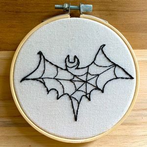 Bat and spider web embroidery